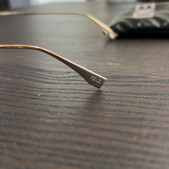 Fendi Hexagonal O’Lock sunglasses. Gold frame and Pink/Purple Lense - Picture 4 of 9